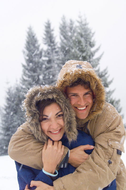 happy couple in snow