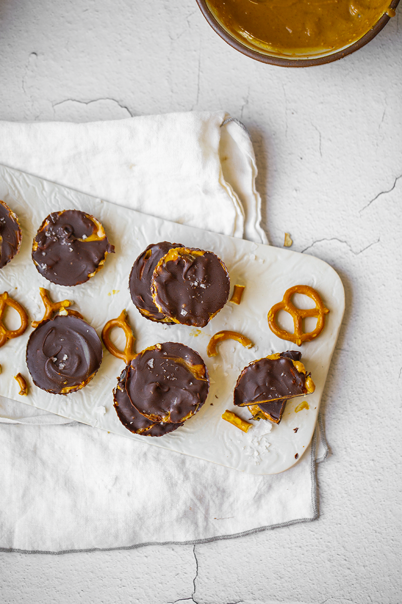 https://healthyhappylife.com/wp-content/uploads/2019/10/pretzel-stuffed-peanut-butter-cups-IMG_3140.png