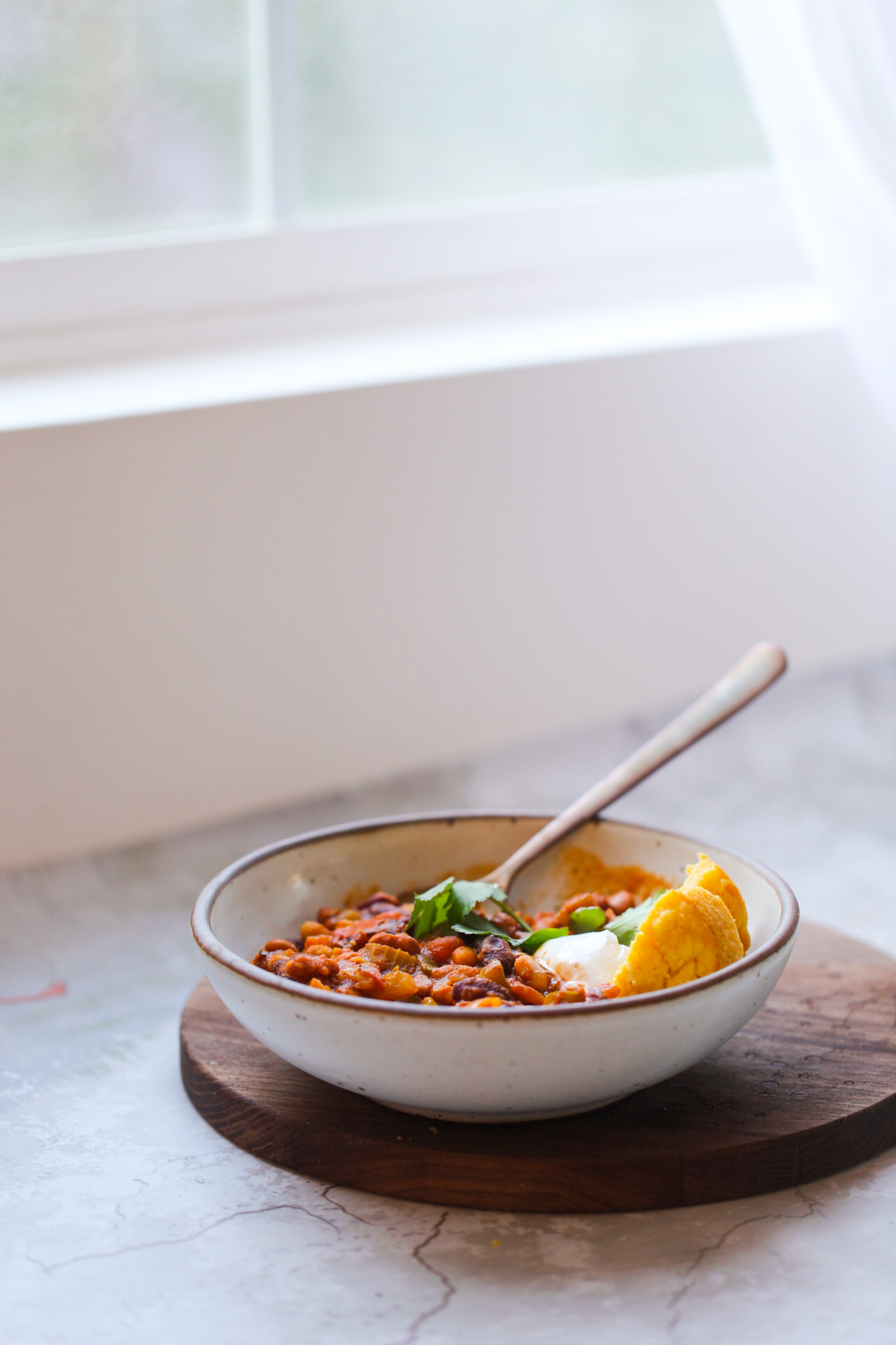 bowl of chili by a window