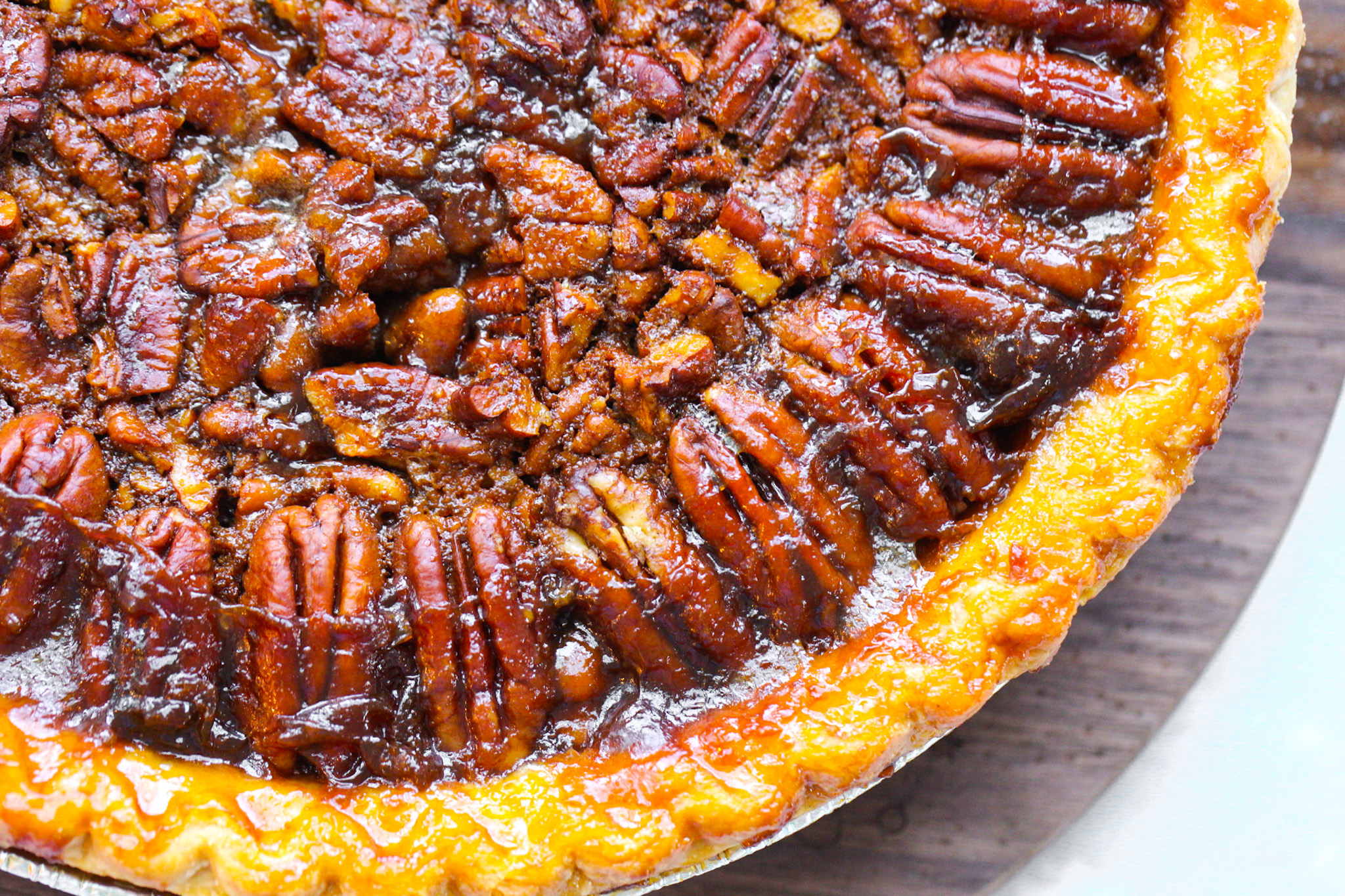 close up pecans on pie