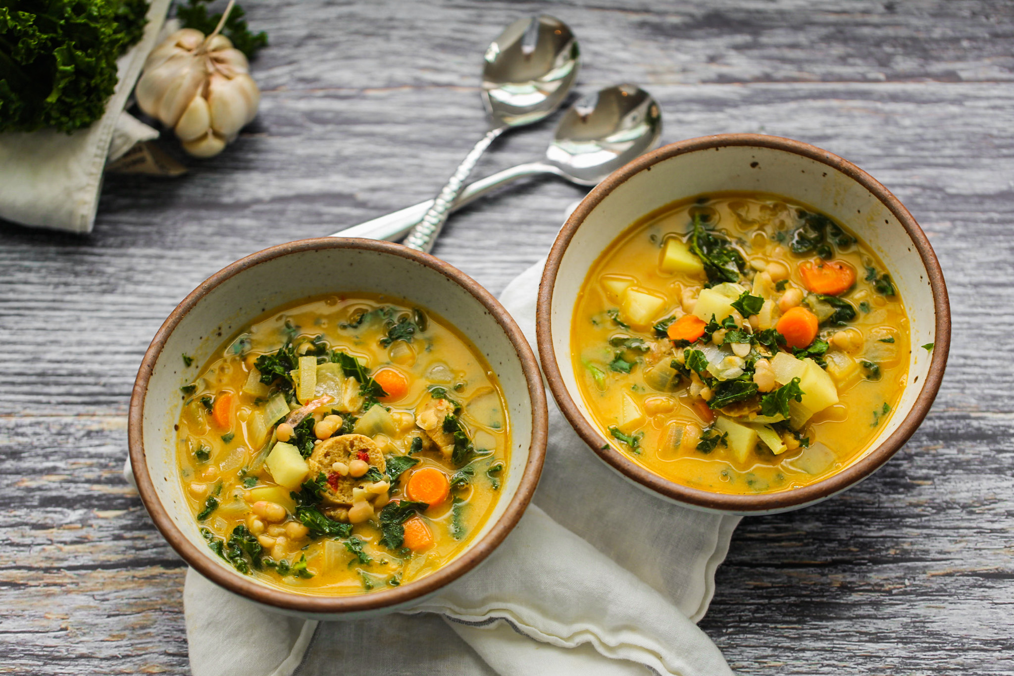 vegan soup with veggies and beans in two bowls