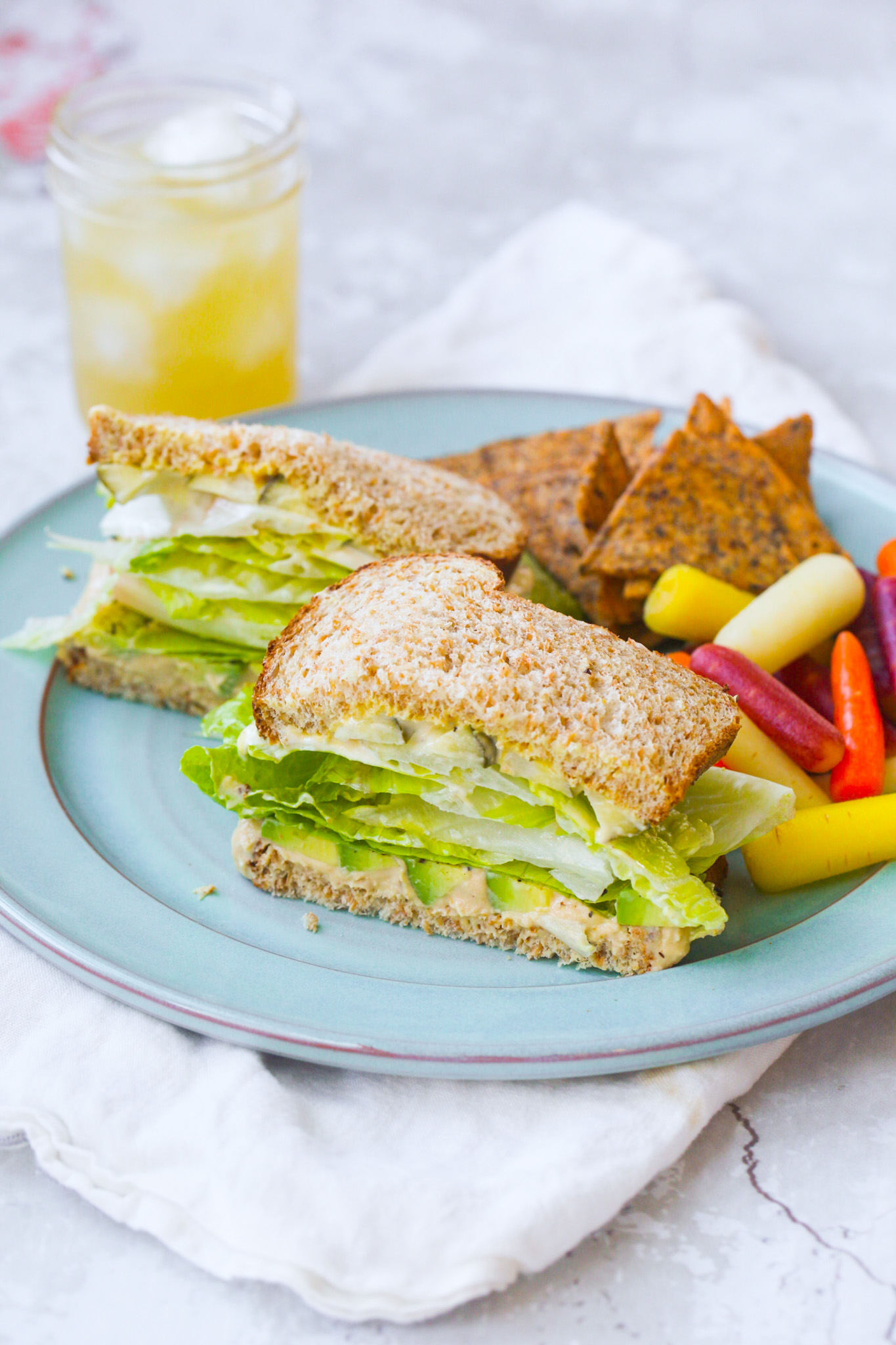 Green Crunch 'n 'Cado Sandwich lunch plate with drink