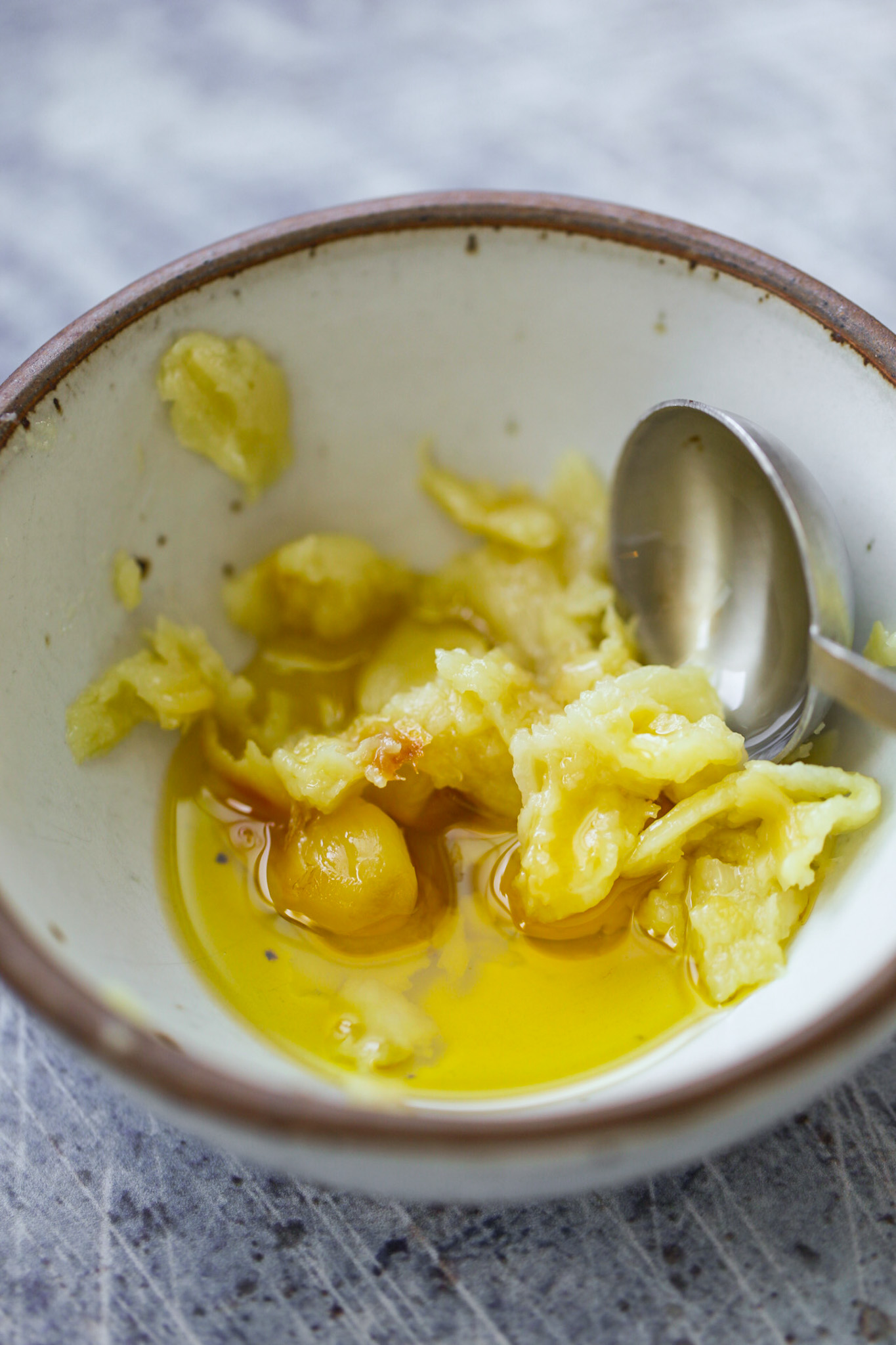 roasted garlic and olive oil in a bowl