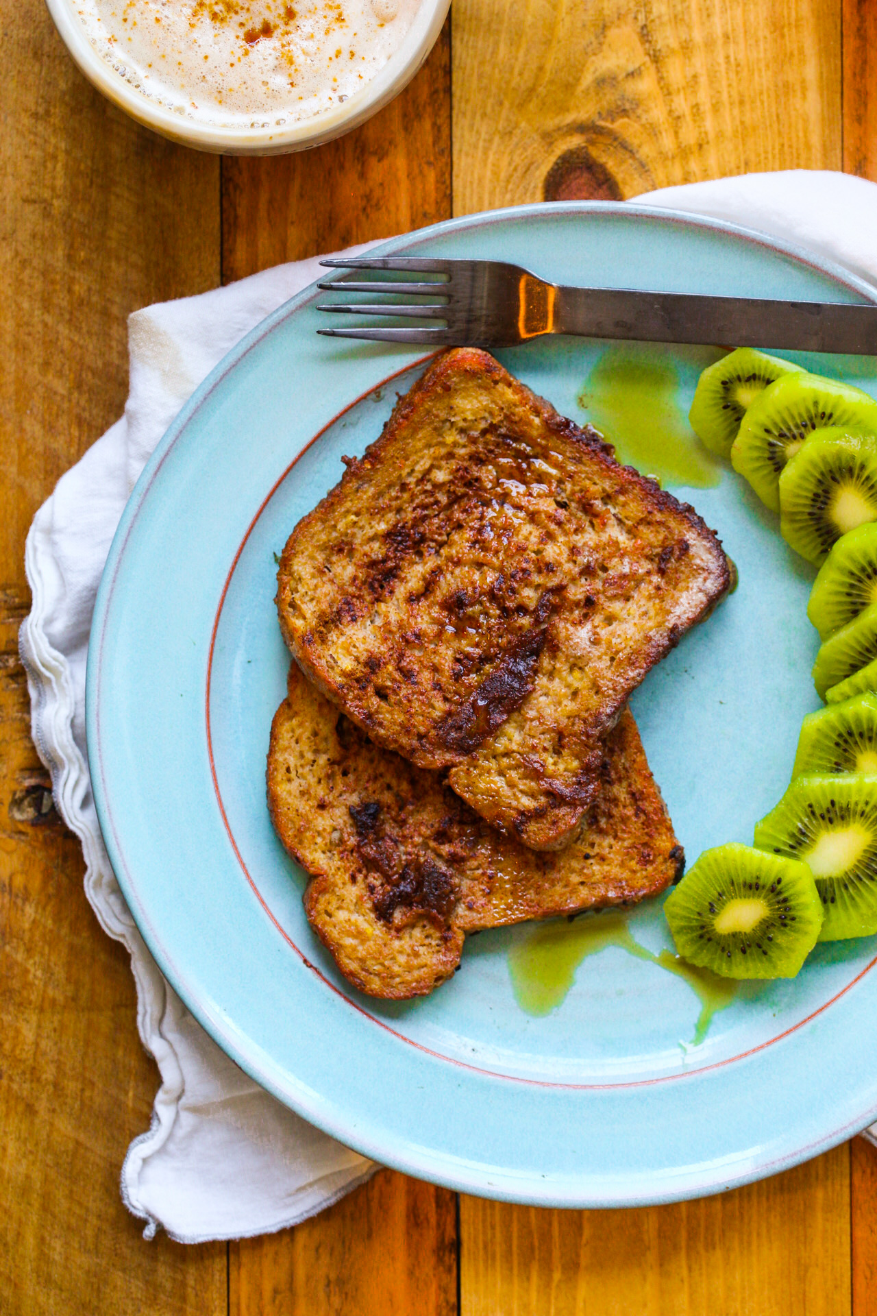 banana french toast on a turquoise plate