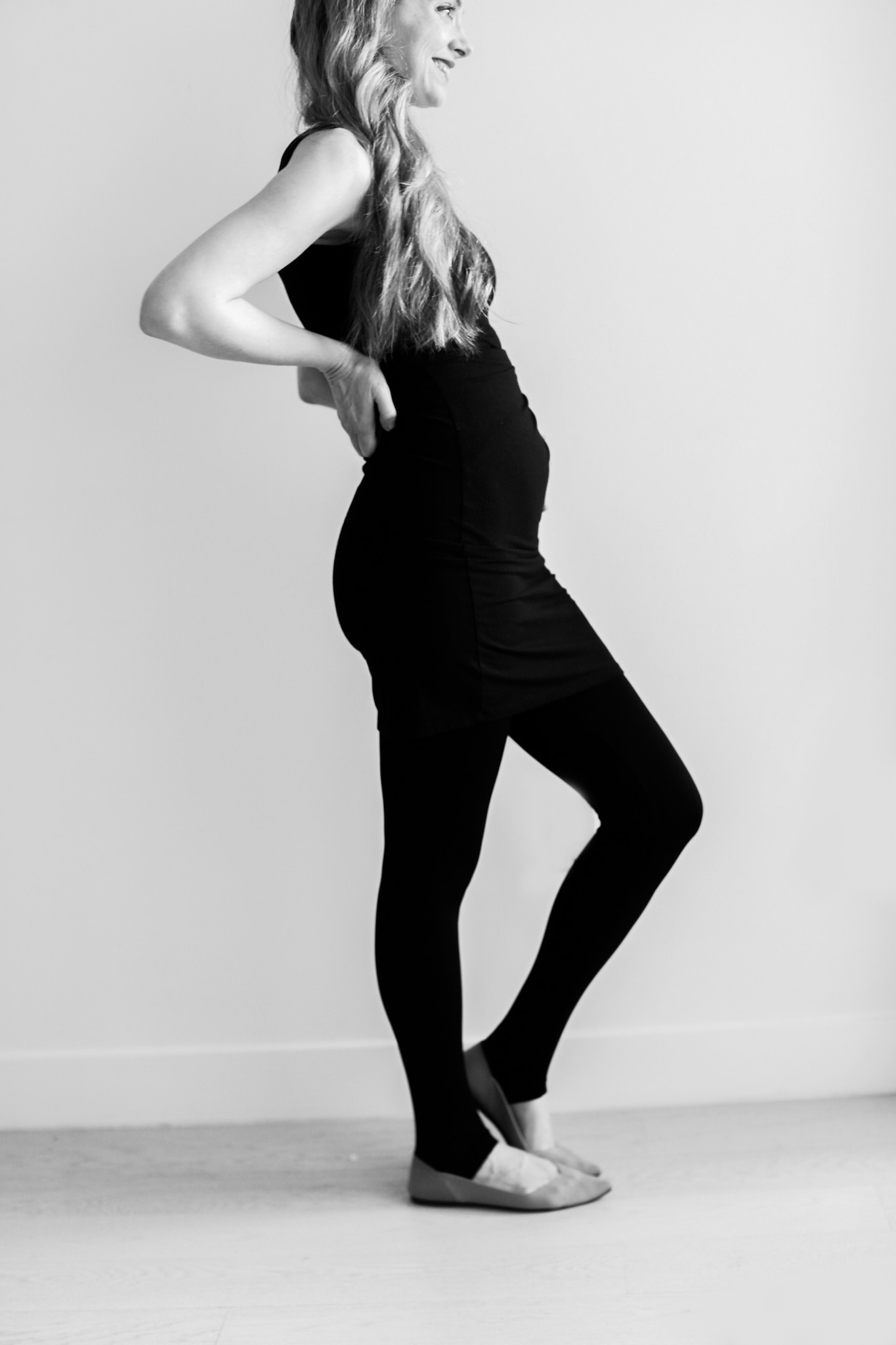 black dress and leggings pregnant bump photos