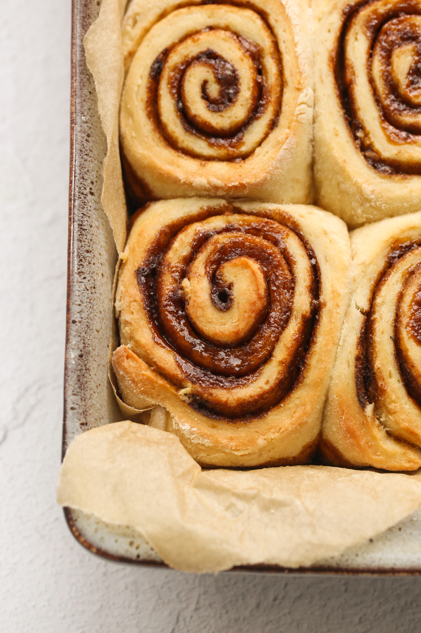 Baked, unfrosted cinnamon buns