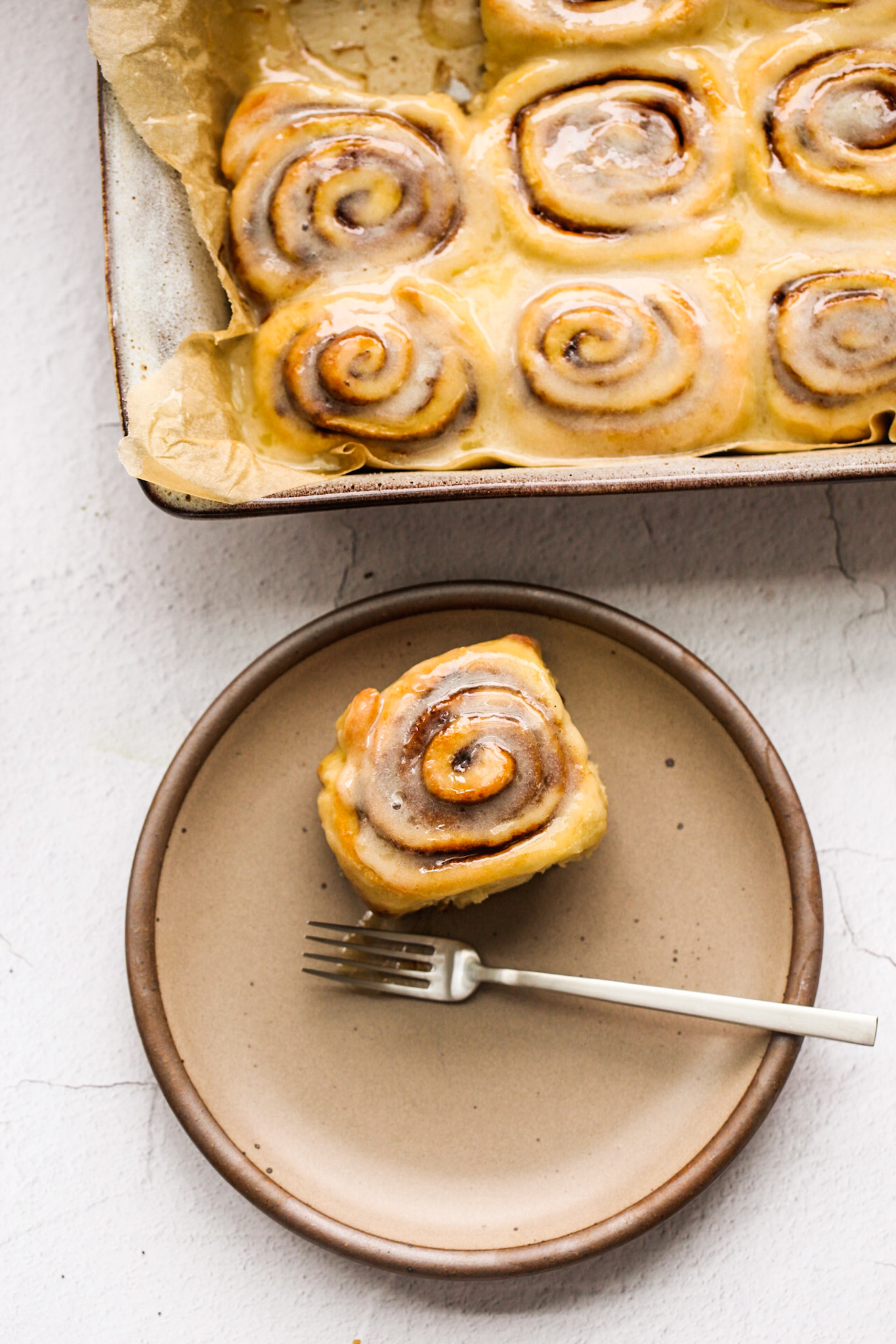 frosted warm cinnamon rolls