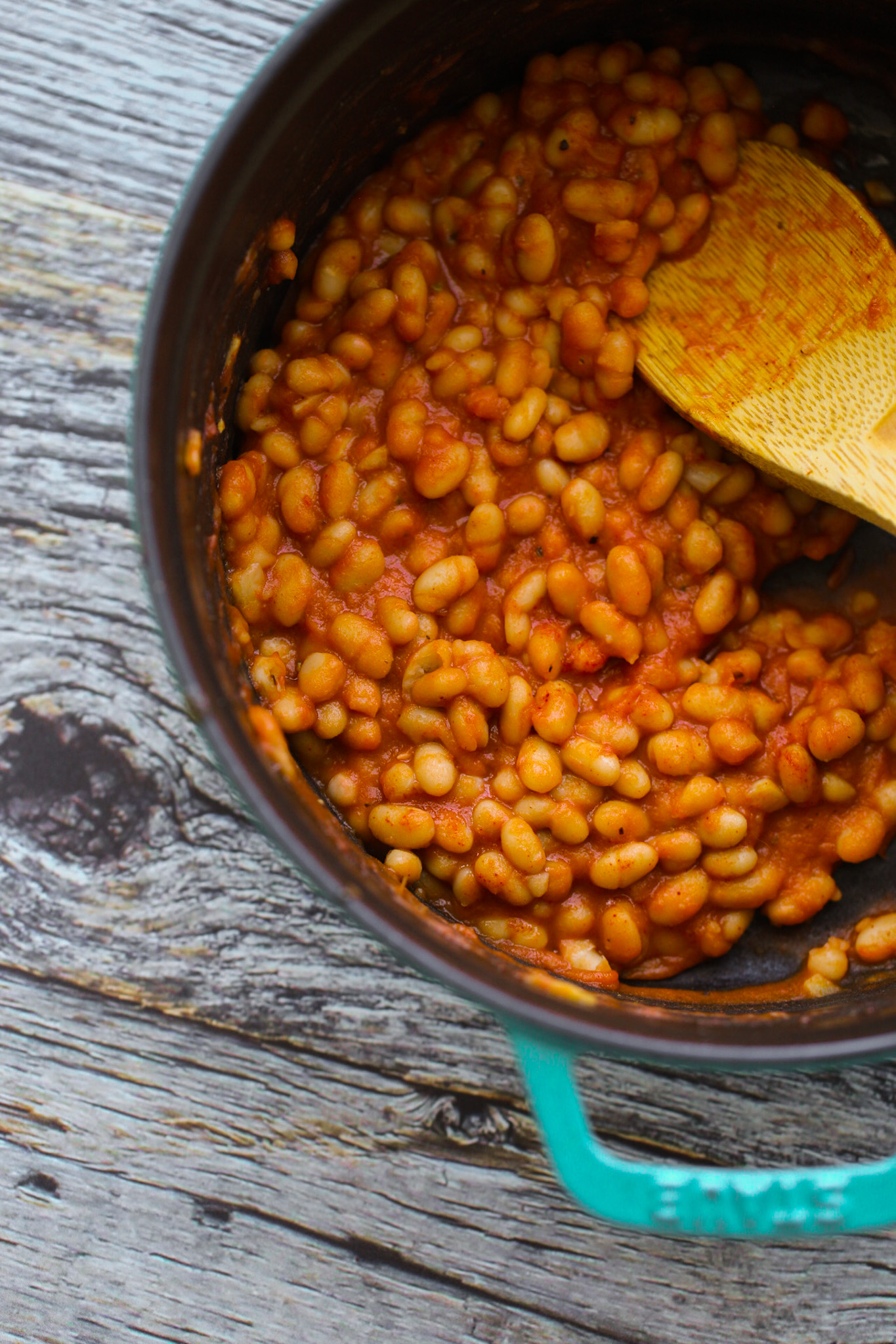 baked beans in a big teal pot