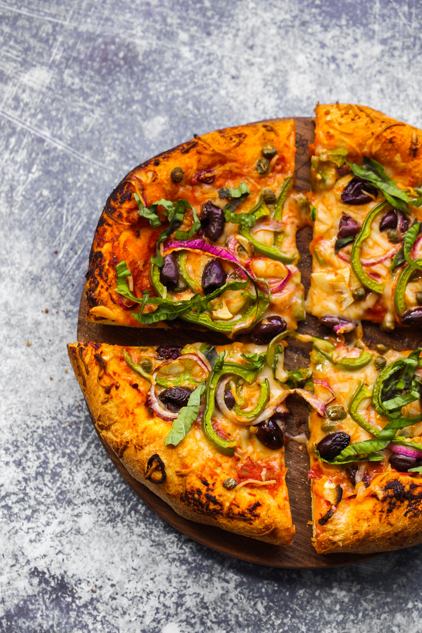 vegan pizza with green peppers and olives