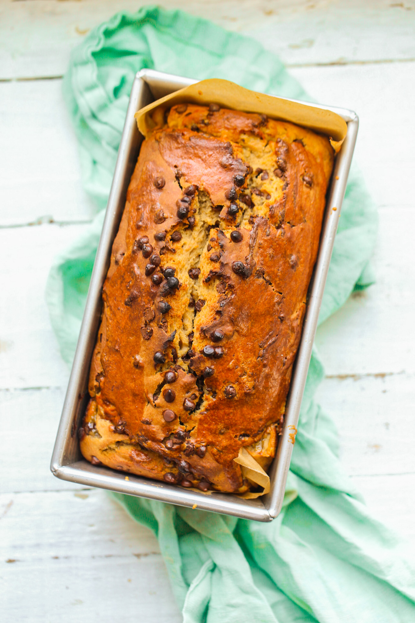 banana bread loaf with teal napkin