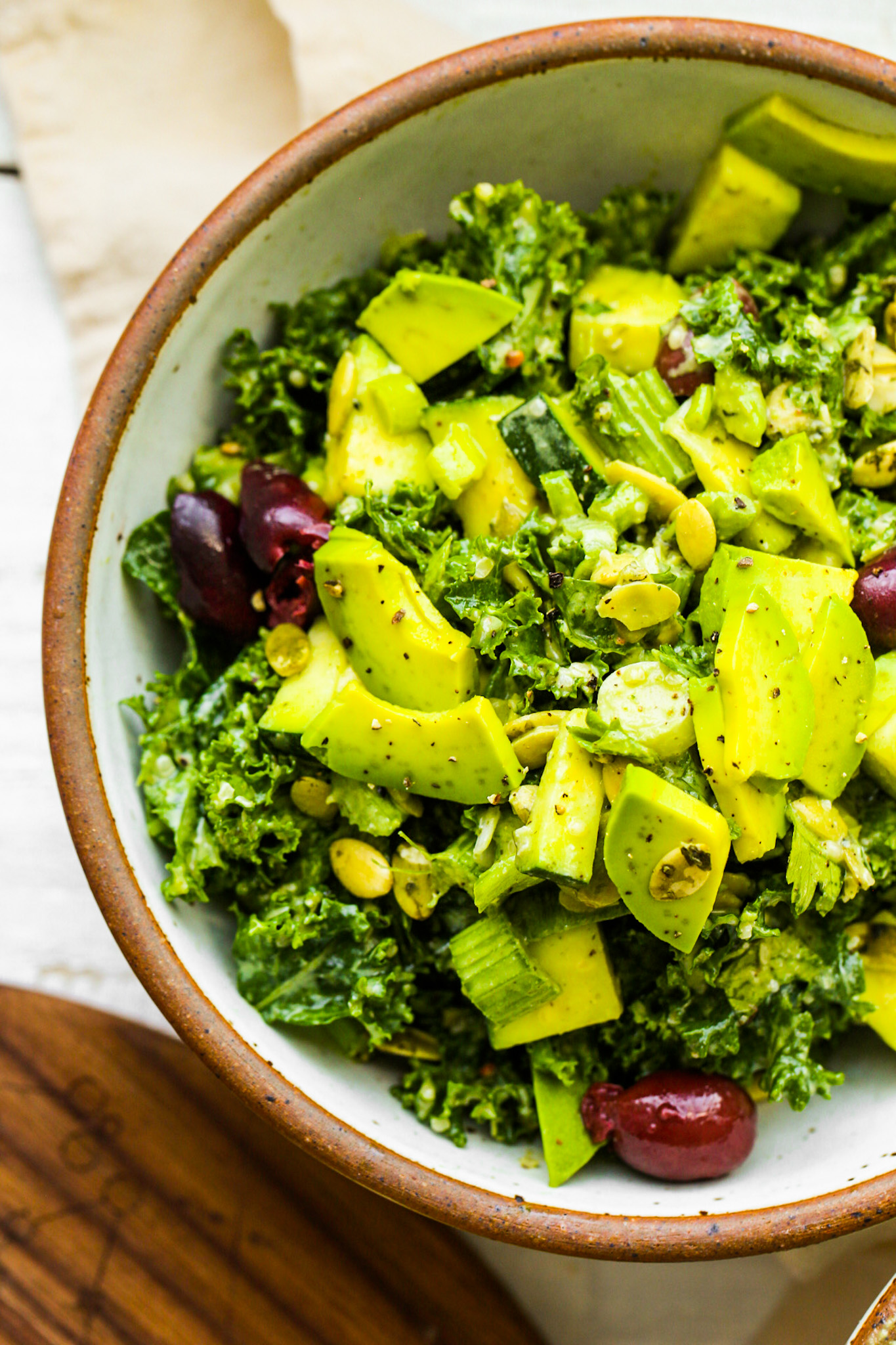 close up of kale avocado salad