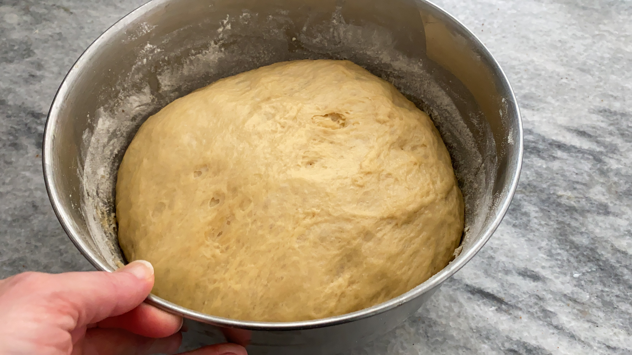 fluffy cinnamon roll dough after rise