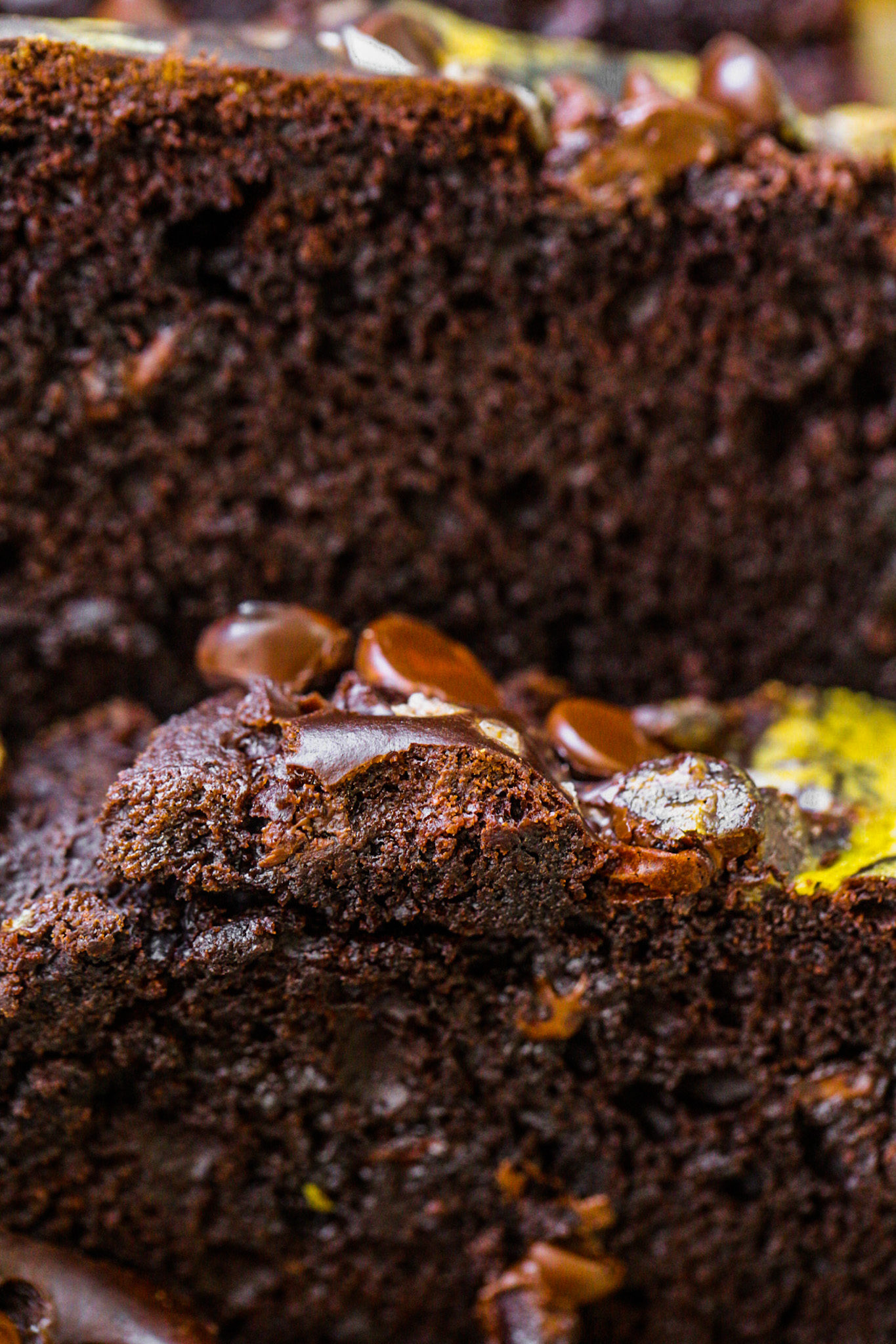 up close melty chocolate chips in chocolate bread