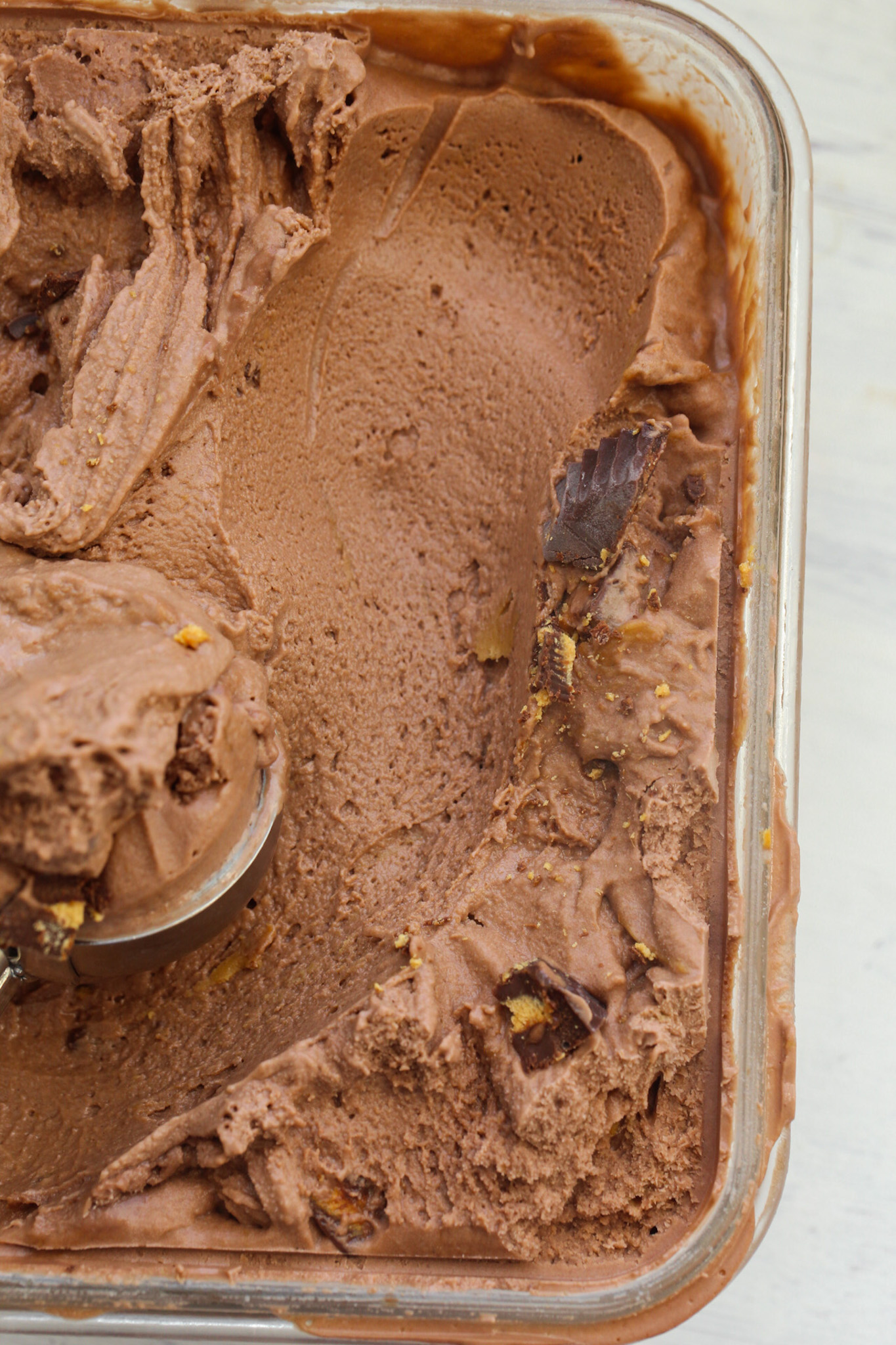 scooping freshly churned ice cream