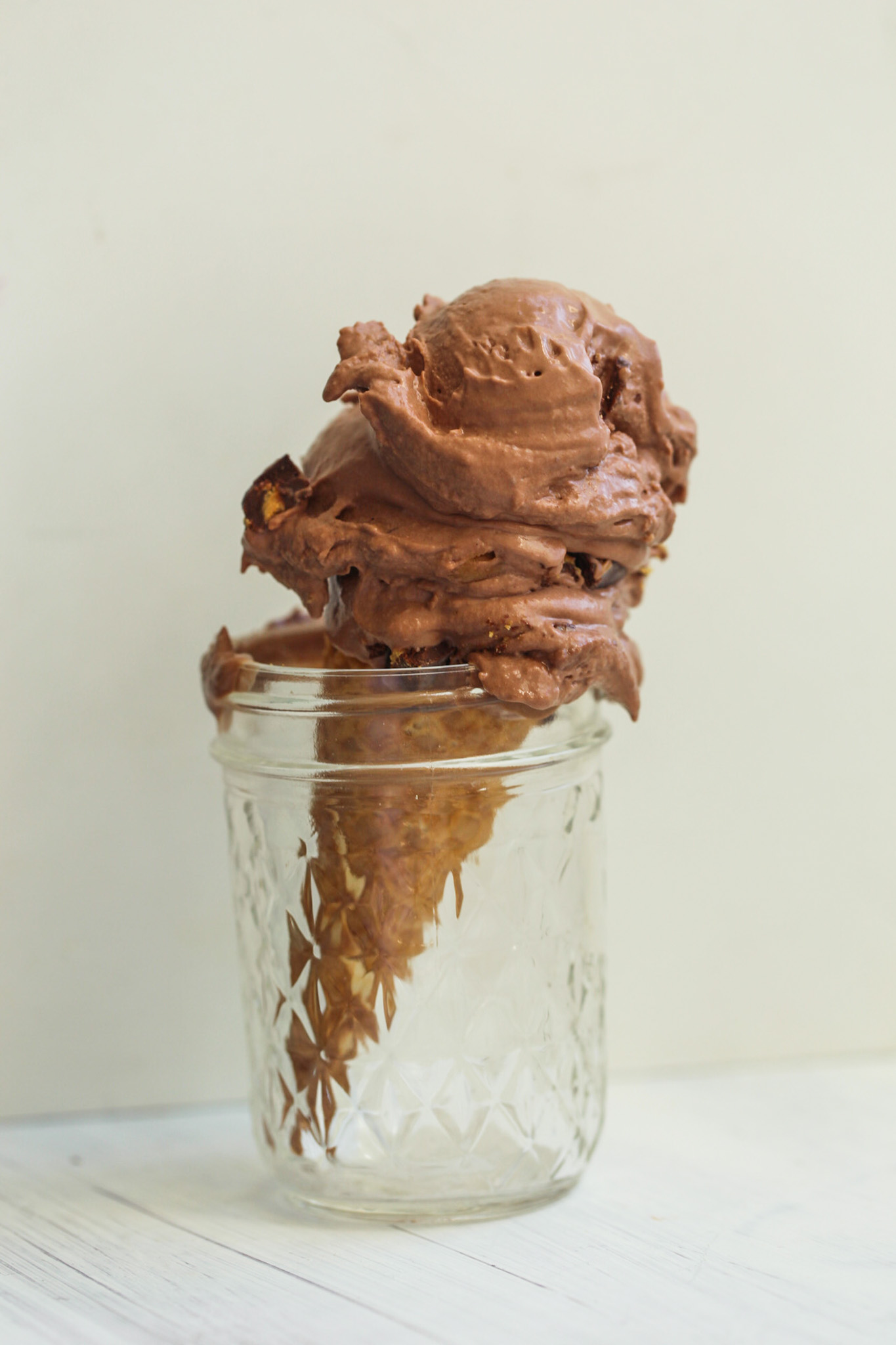 melting vegan chocolate ice cream cone