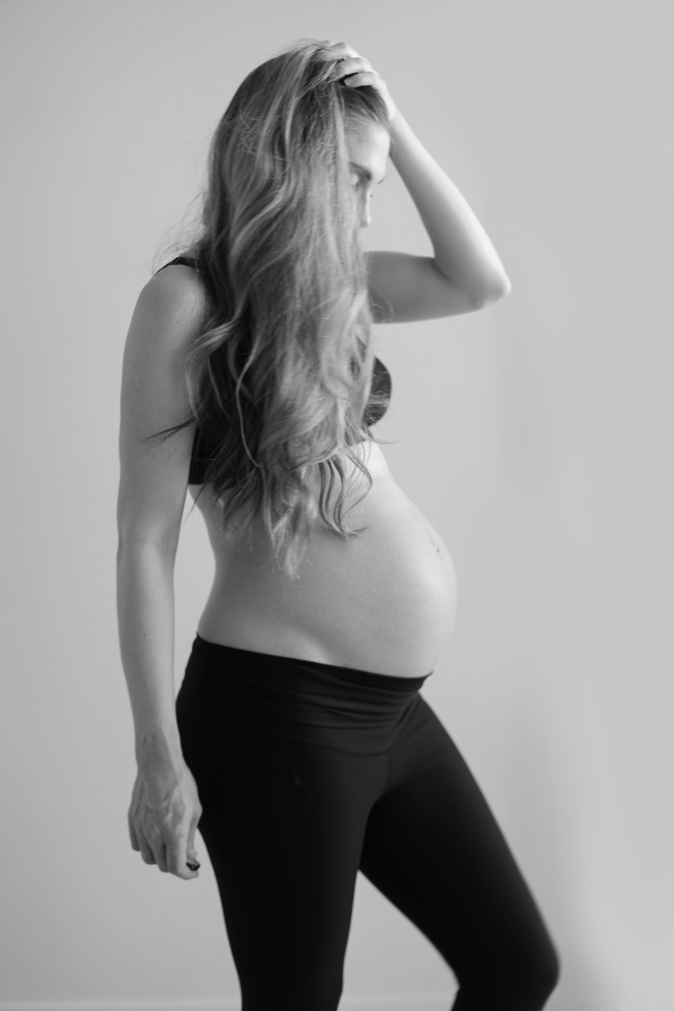 kathy pregnant 37 weeks bare belly maternity photo hair flip