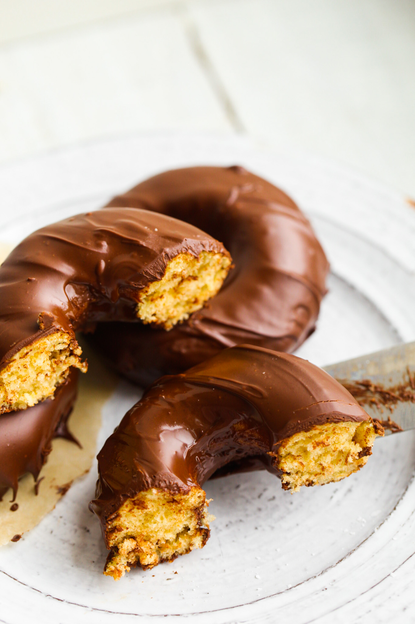 sliced chocolate frosted donuts