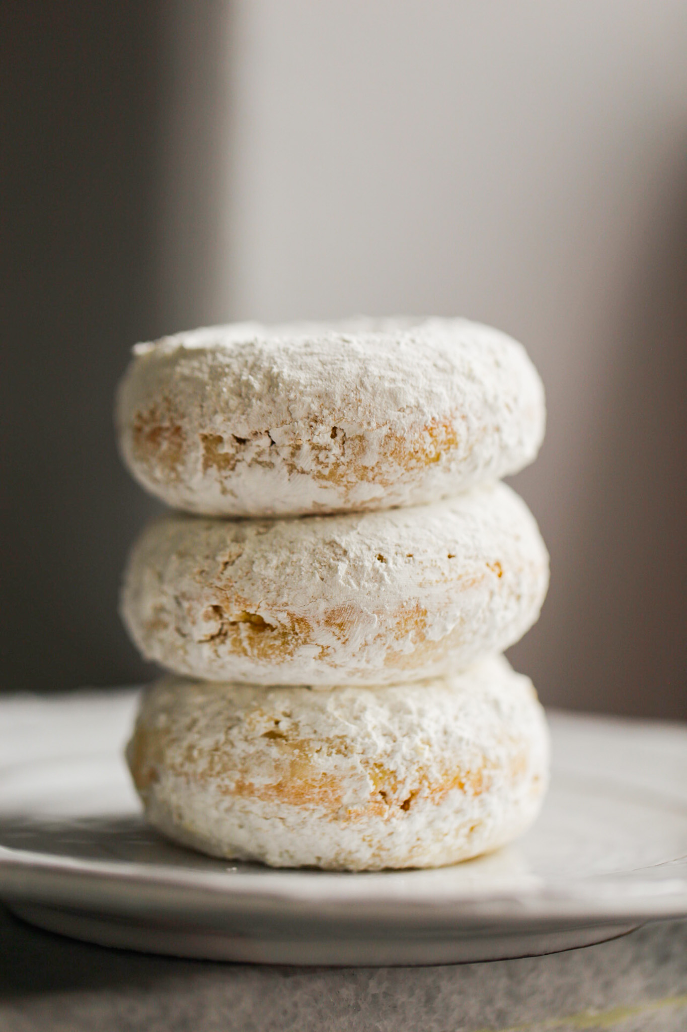 stack of vegan powdered donuts