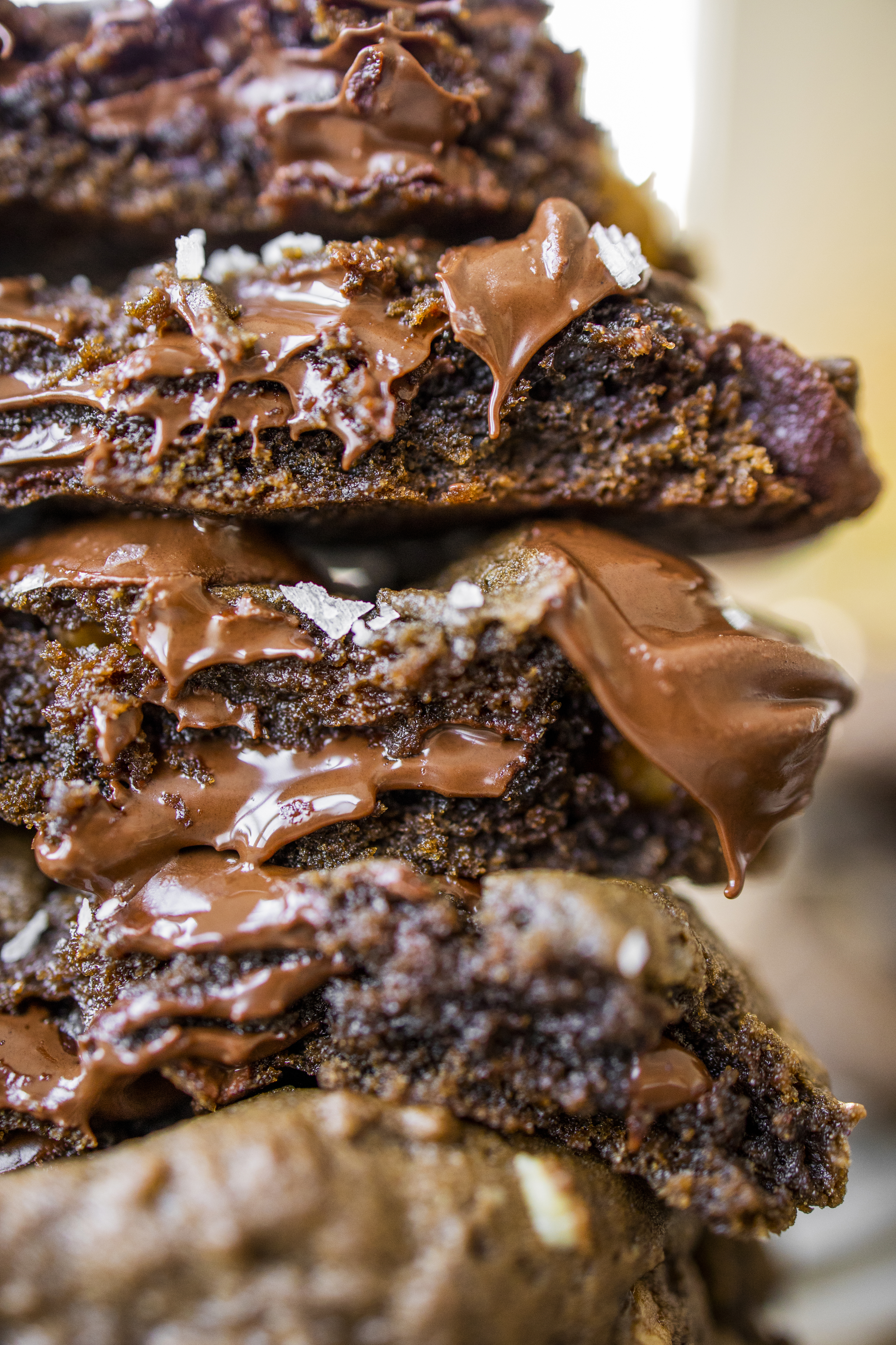 melty stack of vegan double chocolate chip cookies