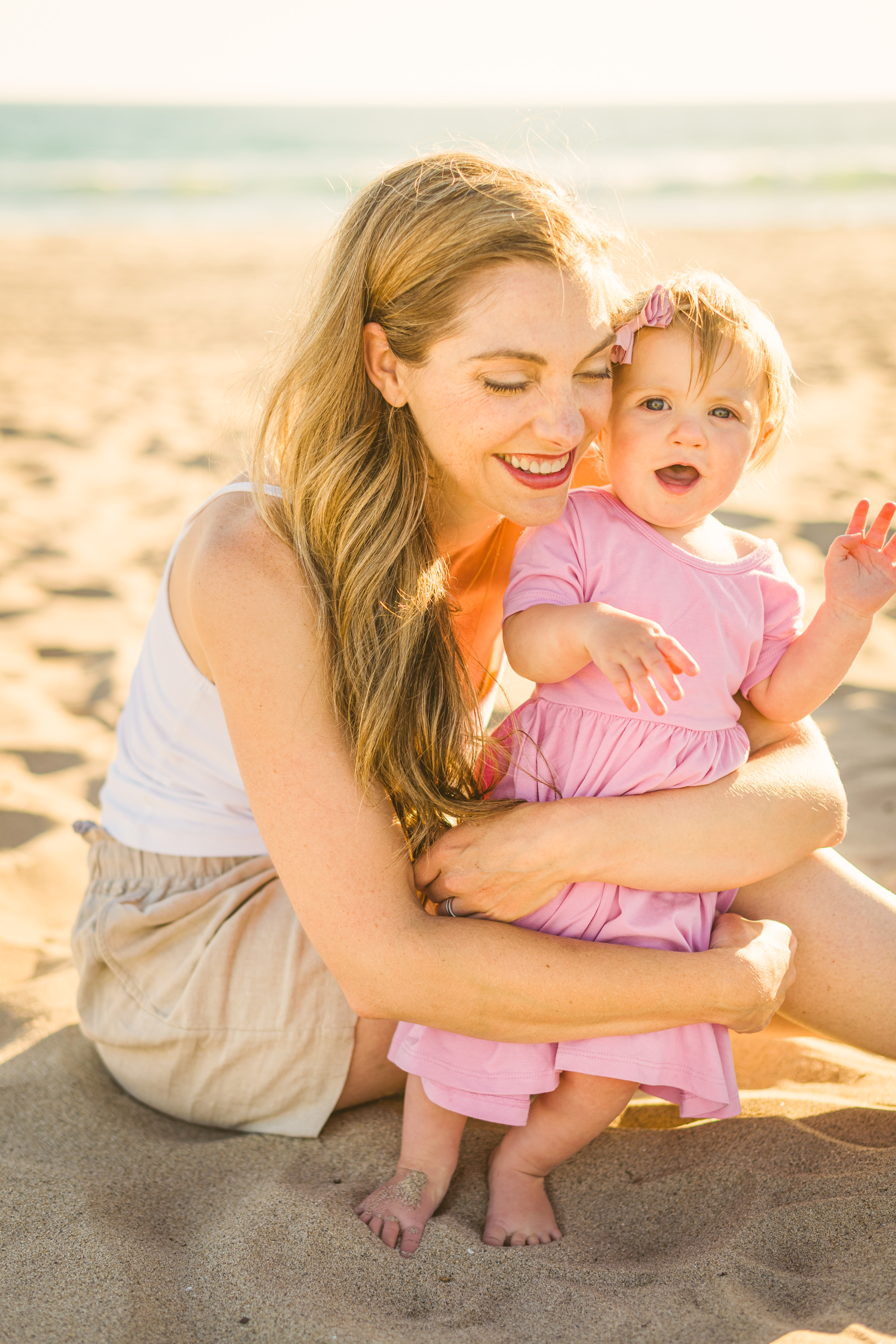 giggly silly baby beach, pink dress