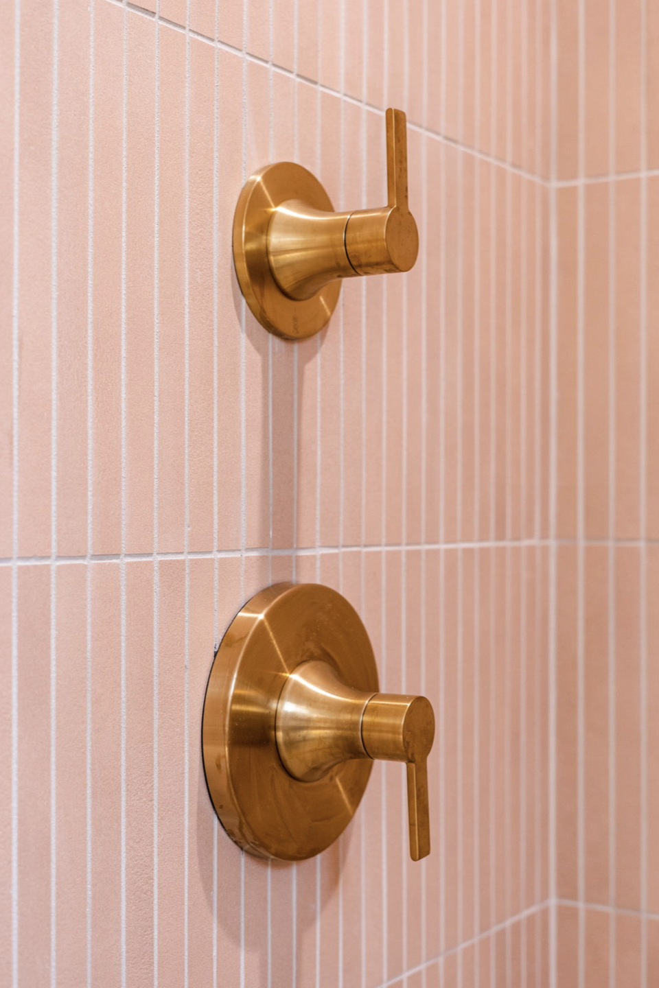gold and pink accents bathroom design