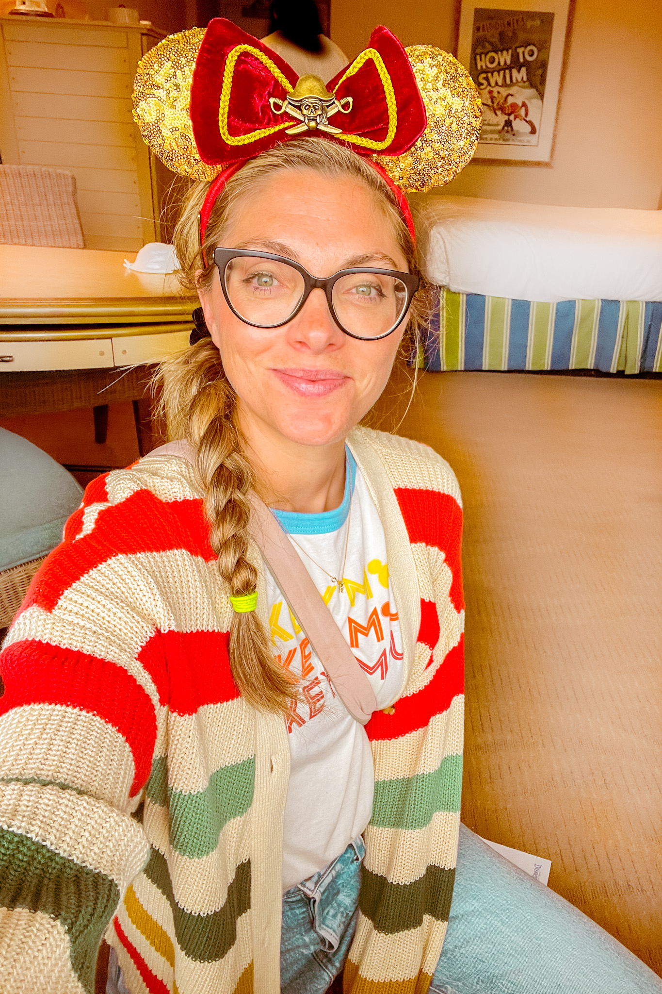 kathy in paradise pier hotel room with pirates minnie ears on