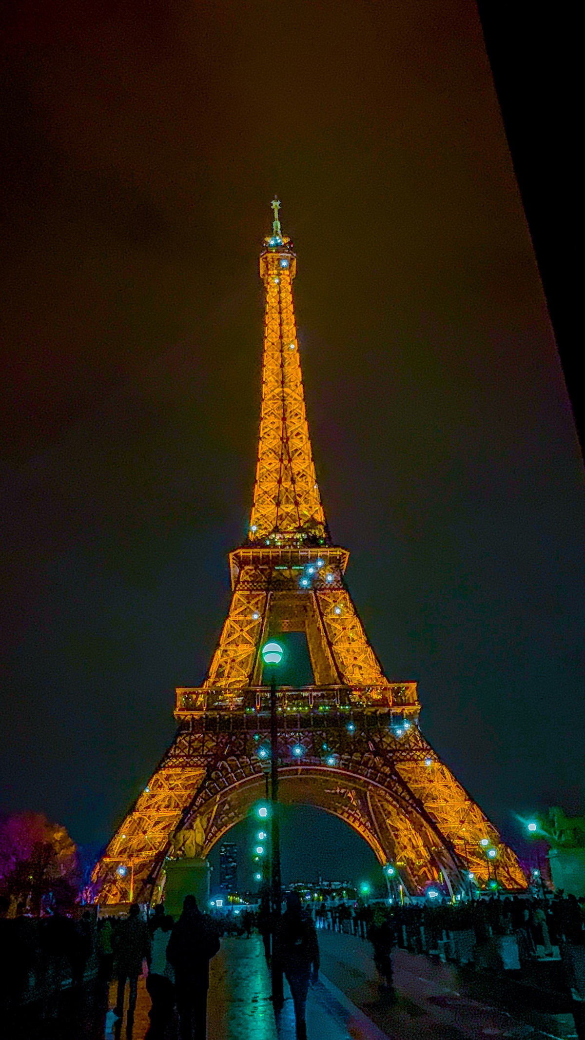 Eiffel Tower in Paris rain night lights